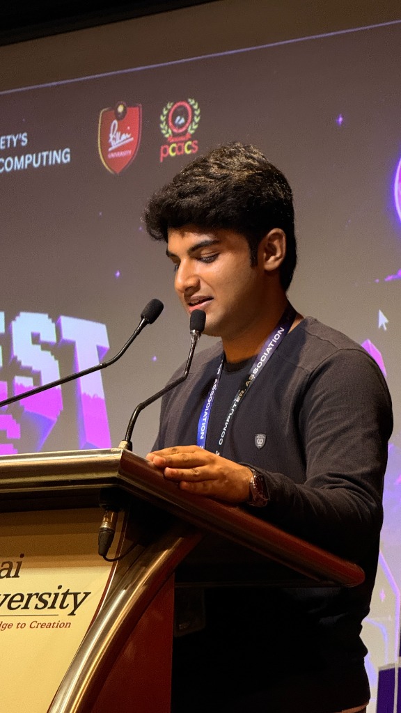 Krishna Kamlesh Singh speaking at the podium at Pillai University